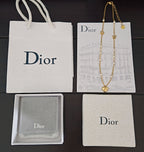 Gold-tone heart pendant necklace set in gift box with Dior shopping bag