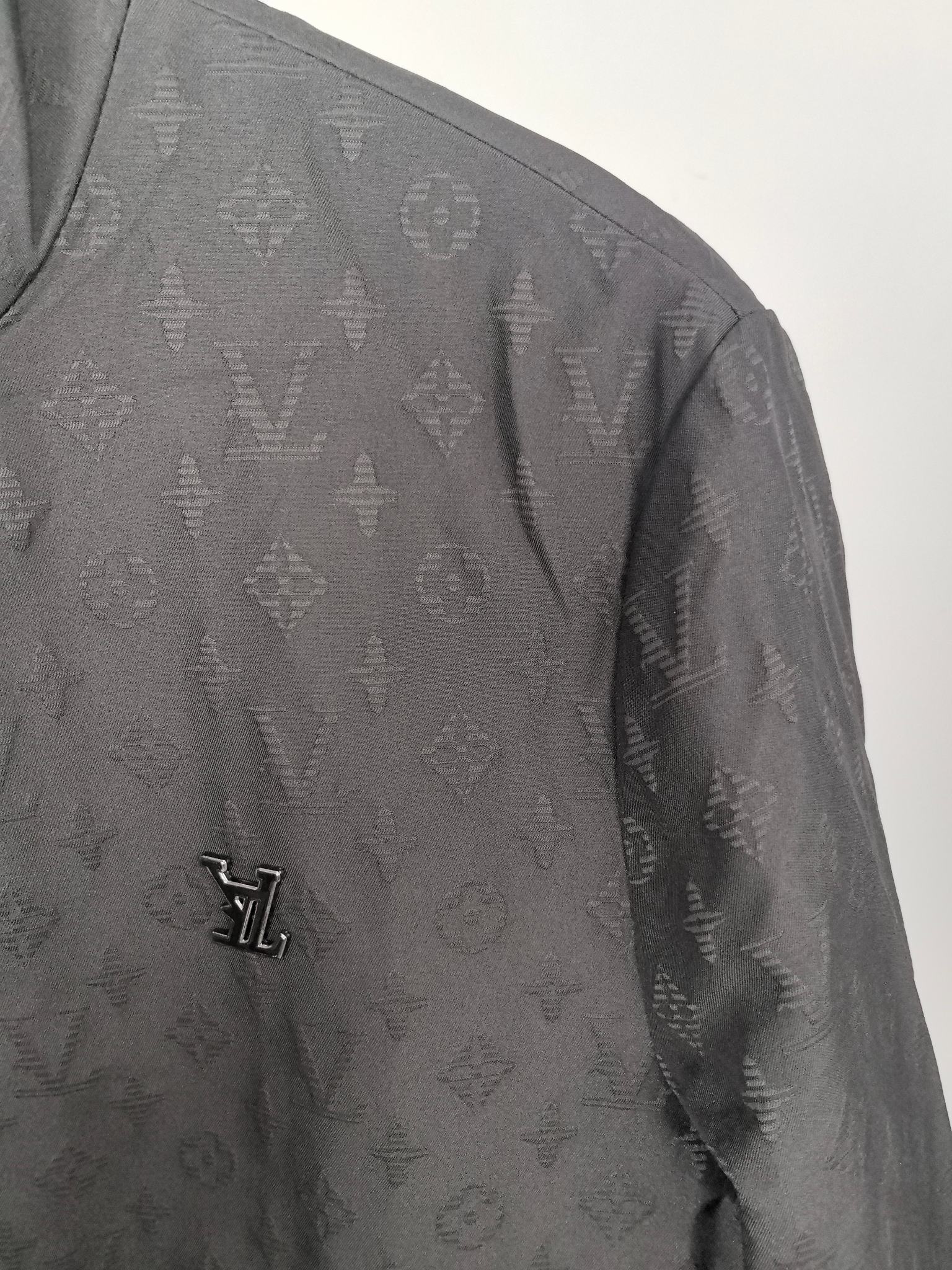 Louis Vuitton monogram zip jacket sleeve with small LV logo detail