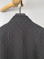 Louis Vuitton monogram jacket back, dark gray textured fabric with allover pattern