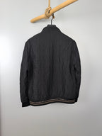 Dior long jacket, dark back view with stand collar and ribbed hem band