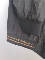 Dior long jacket hem cuff with ribbed knit band and orange lettering stripe