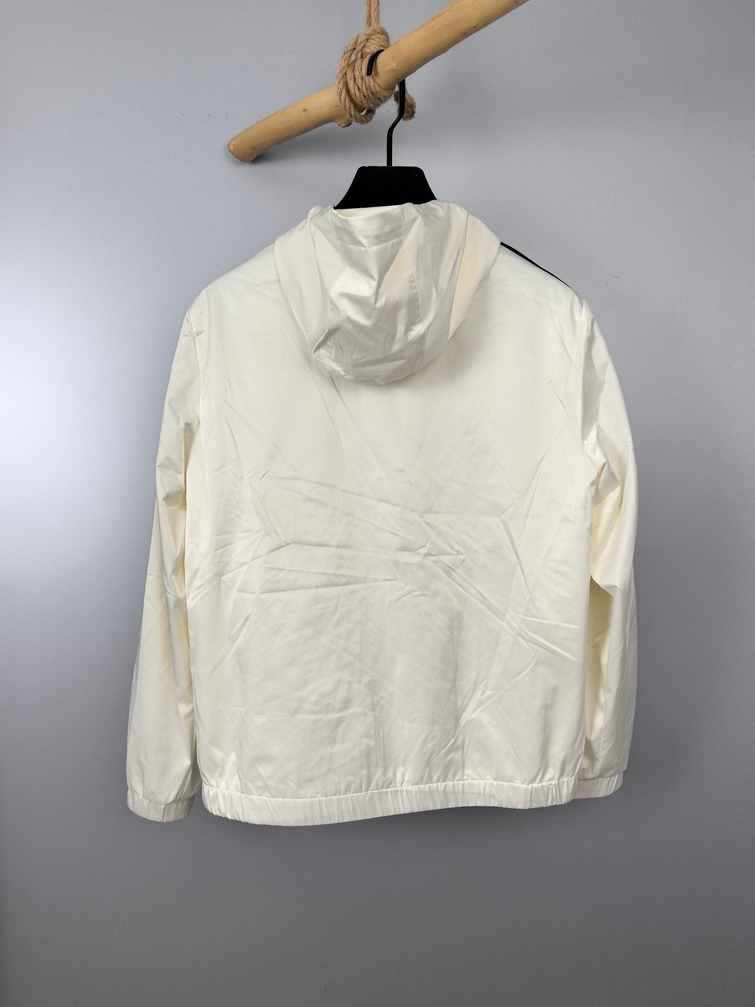 Moncler hooded long jacket in off-white, back view with full zip