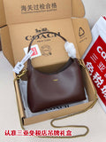 Coach hobo bag in dark brown with gold chain strap and top handle