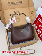 Coach hobo bag in dark brown with gold chain strap and top handle