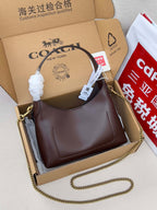 Coach hobo bag in dark brown leather with gold chain shoulder strap