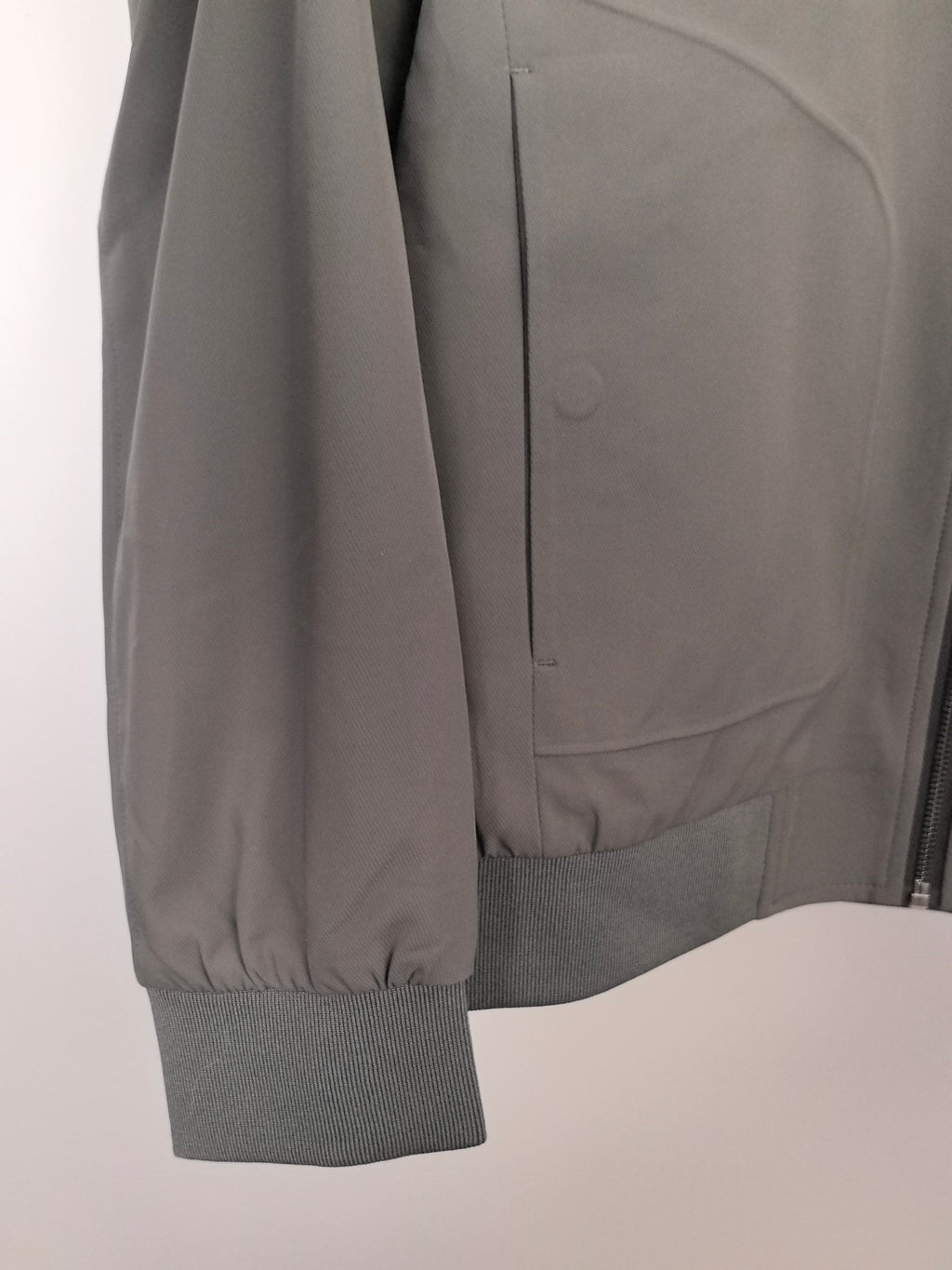 Prada jacket sleeve cuff and side panel, dark gray with zipper edge detail