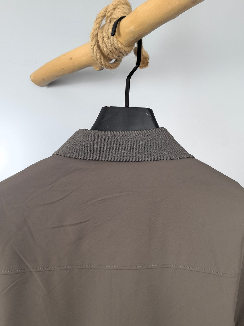 Men's Prada jacket back neckline view, taupe with textured stand collar