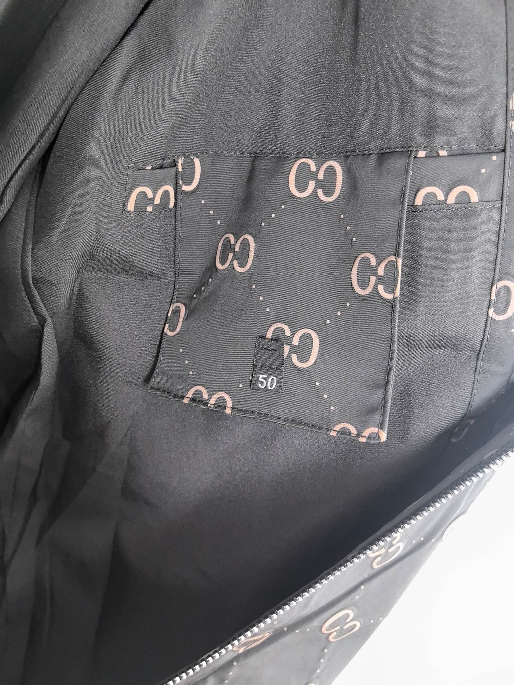 Gucci hooded jacket lining, dark gray with rectangular size label pocket
