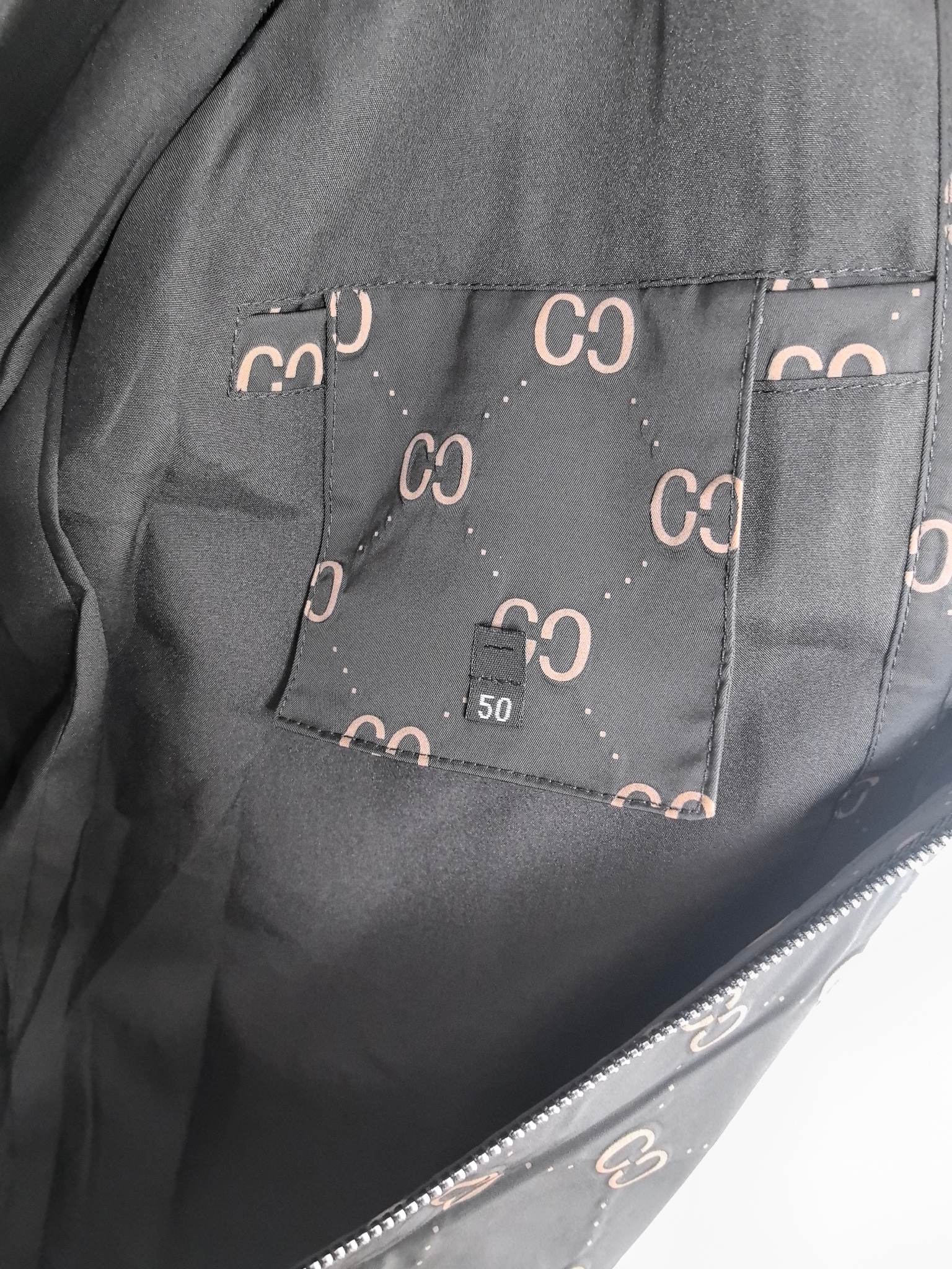 Gucci hooded jacket lining, dark gray with rectangular size label pocket