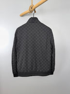 Gucci monogram zip jacket, back view with stand collar and ribbed hem
