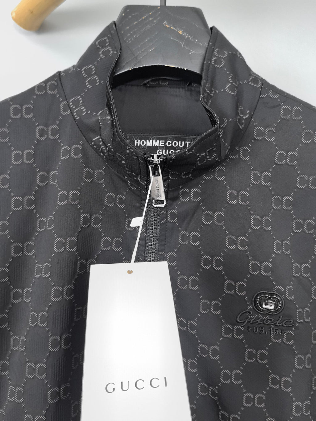 Gucci monogram zip jacket front with stand collar and visible zipper pull