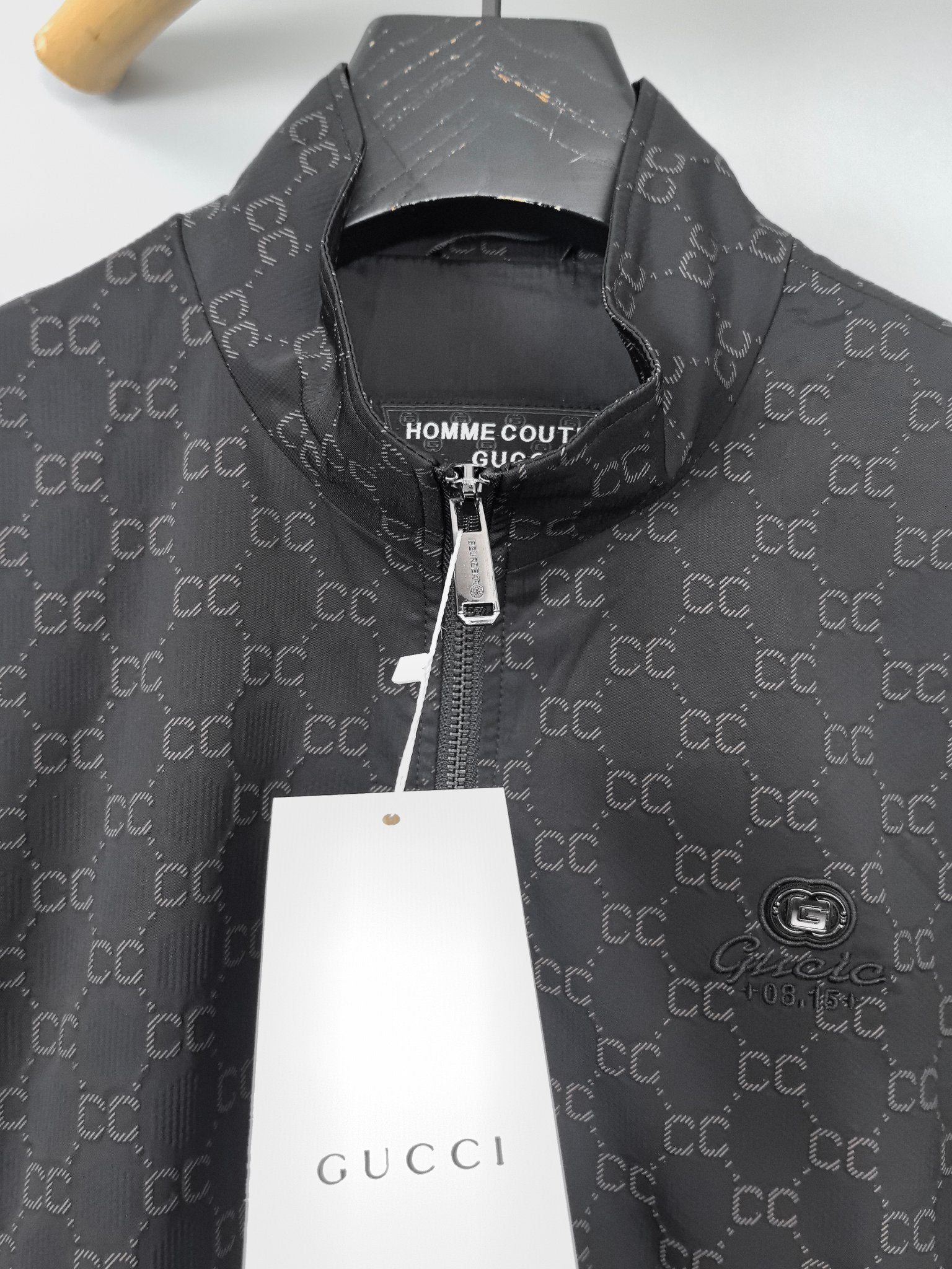 Gucci monogram zip jacket front with stand collar and visible zipper pull