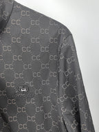 Gucci monogram zip jacket shoulder and upper sleeve with subtle fabric texture
