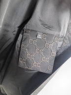 Gucci monogram zip jacket inner pocket panel with stitched label patch