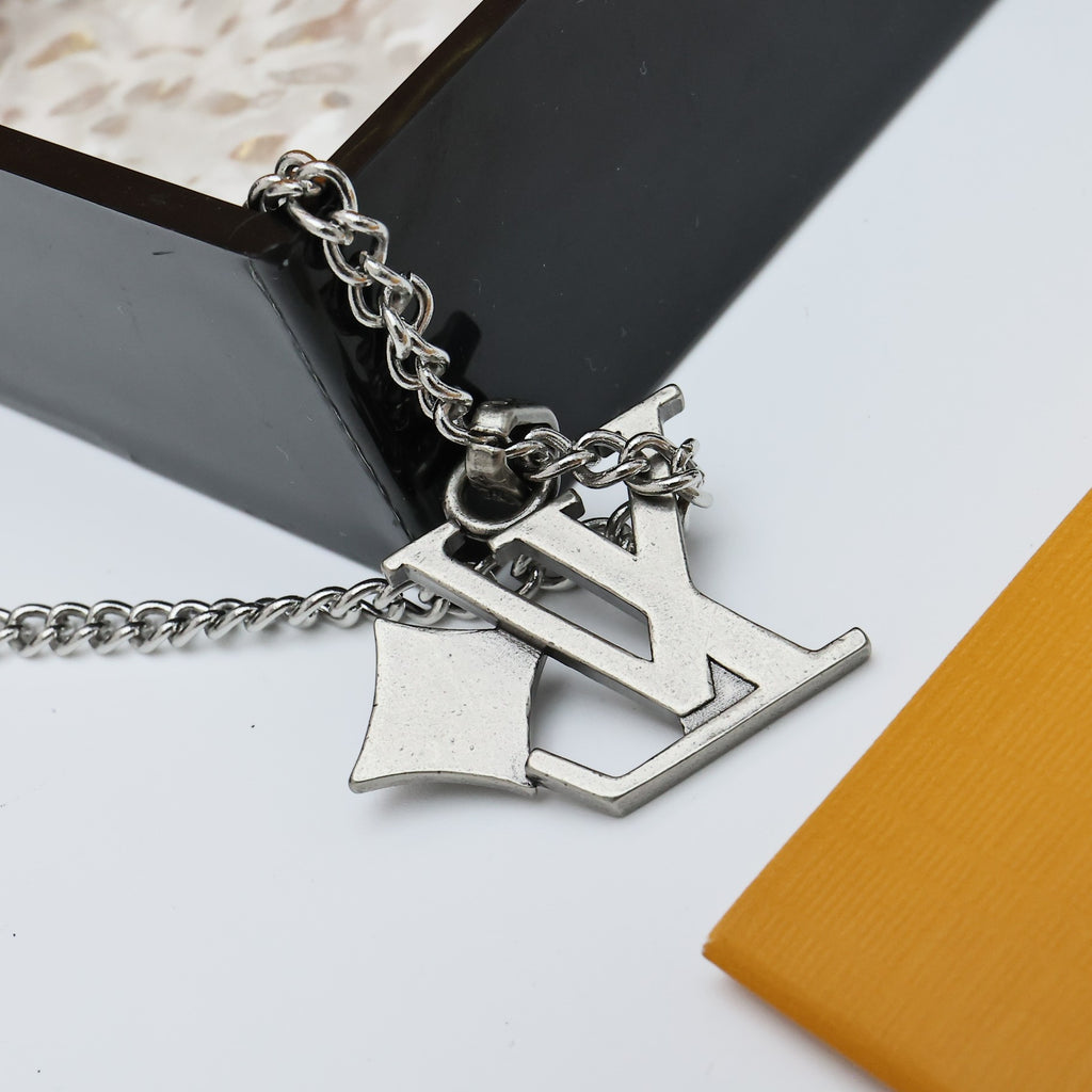 Silver charm necklace clasp with LV letter pendant and chain links