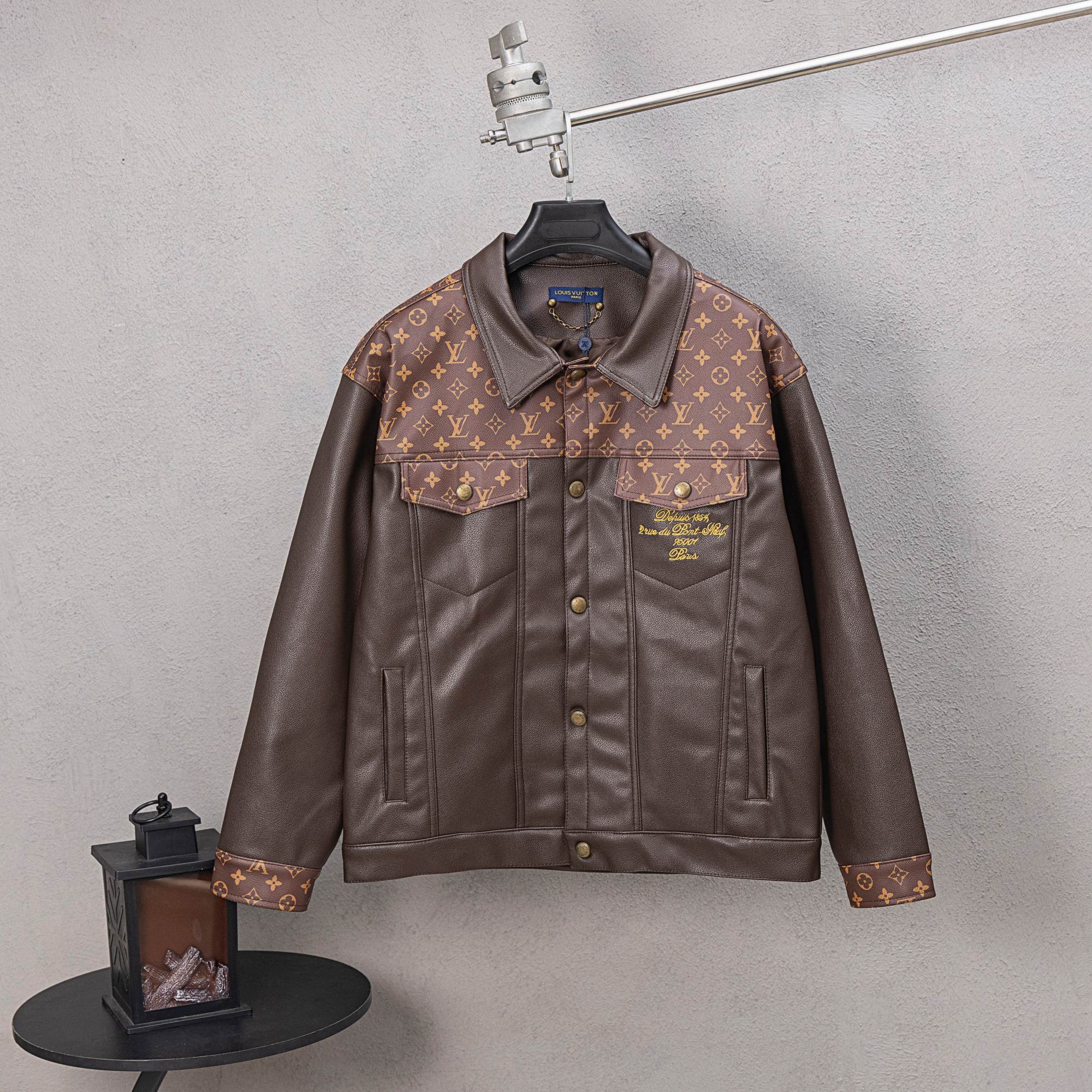 Louis Vuitton long coat, brown leather with monogram panels, button front and chest pockets