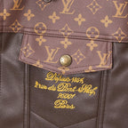 Louis Vuitton long coat pocket flap, monogram trim with stitched decorative script