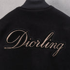 Black jacket with large Diorling cursive logo on back