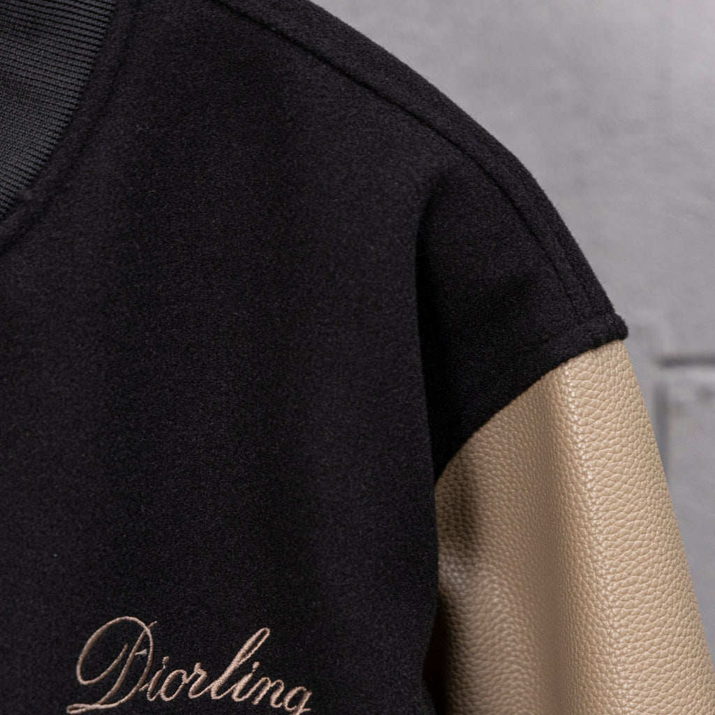 Black and beige long-sleeve jacket sleeve with Diorling embroidery detail