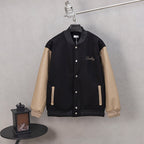 Black long-sleeve varsity jacket with button placket and Diorling script logo