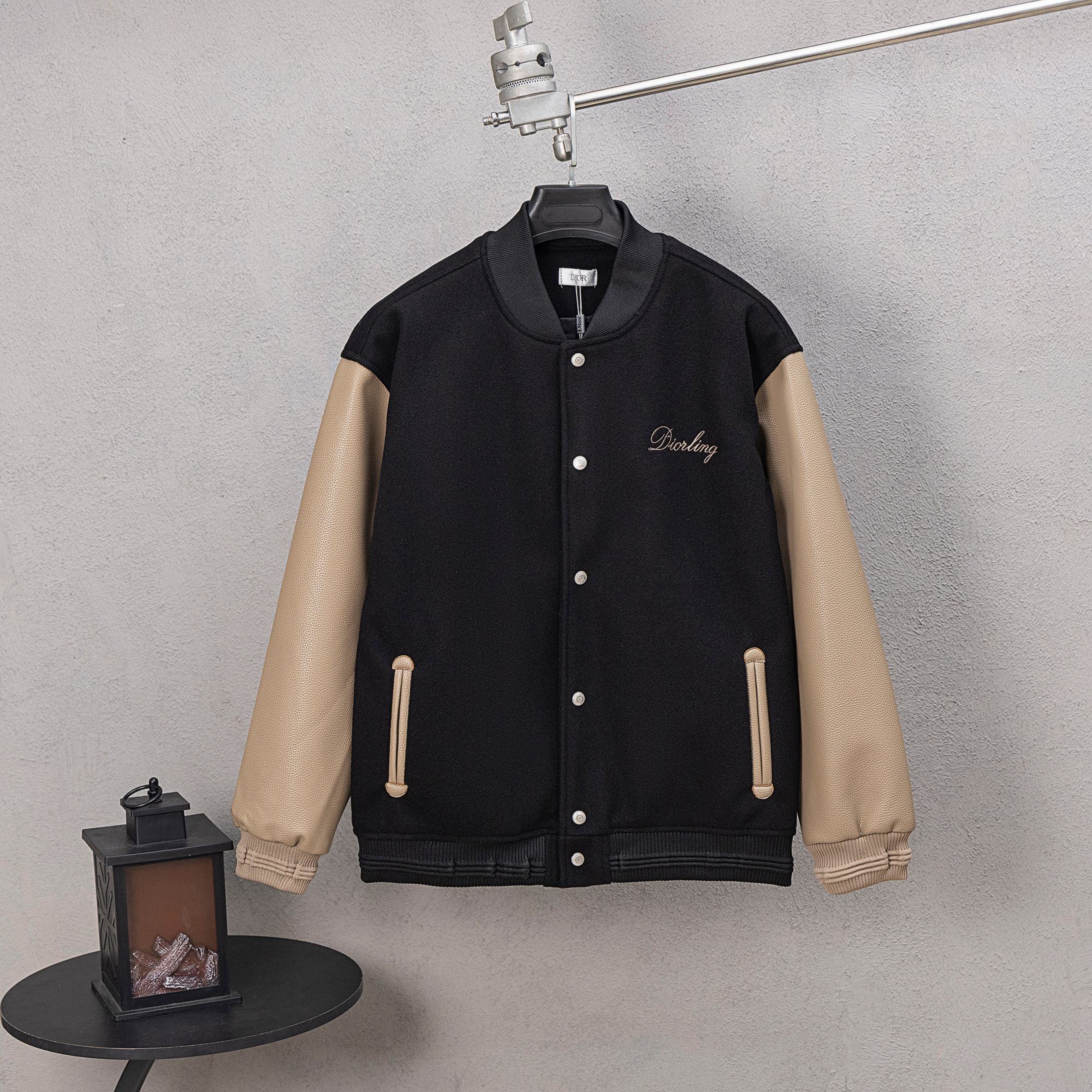 Black long-sleeve varsity jacket with button placket and Diorling script logo
