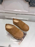 Balenciaga suede slide sandals, tan pair with open toe and rounded vamp