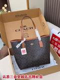 COACH tote bag, navy patterned canvas with tan leather handles, in gift box with tags