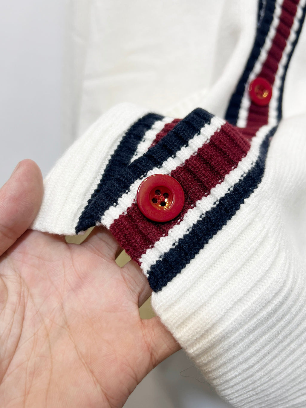 Gucci long cardigan sleeve cuff with maroon, navy, and white striped knit band