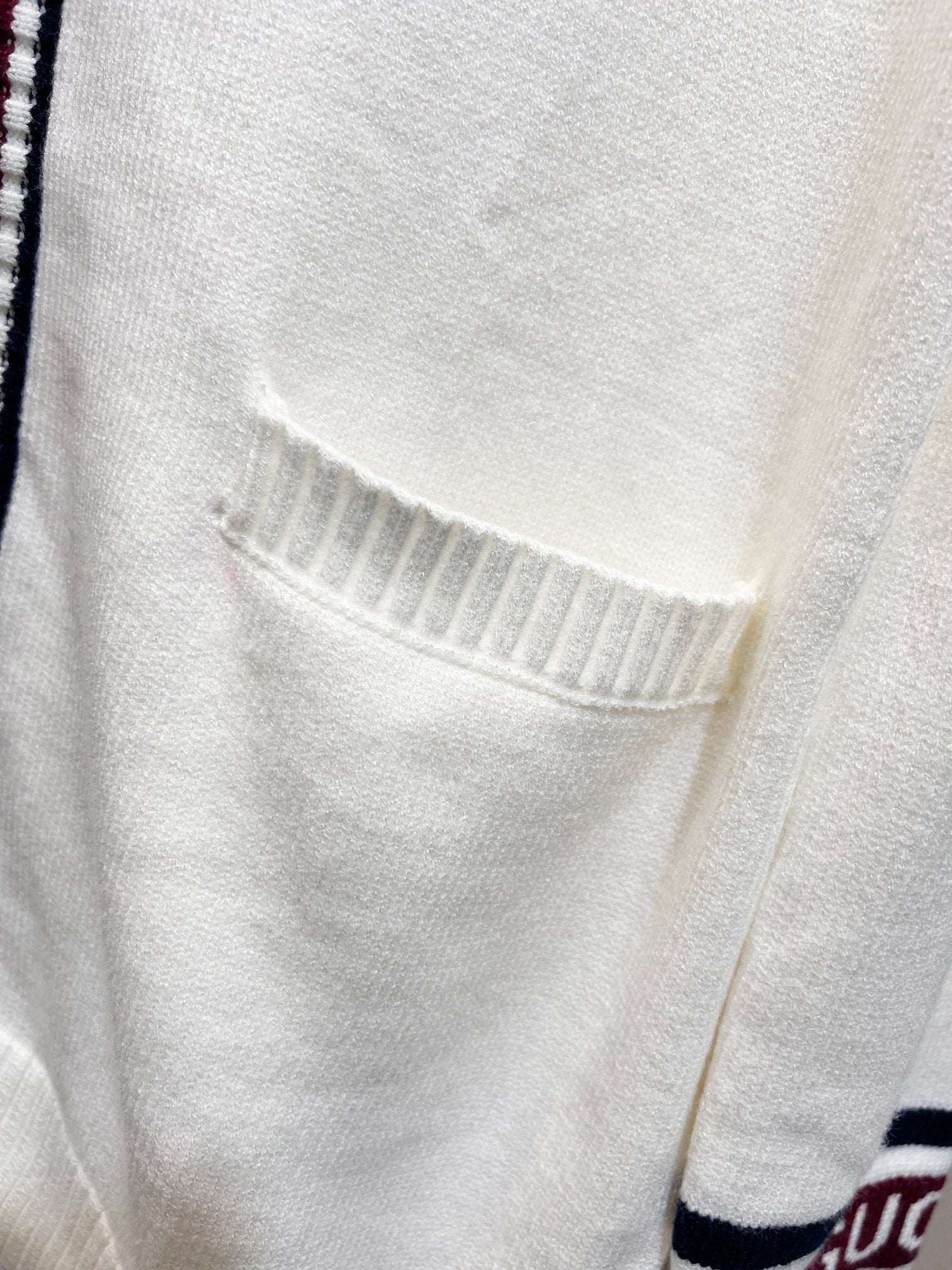 Gucci long cardigan chest pocket detail on white knit fabric