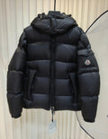 Moncler long padded jacket in dark color, quilted pattern, full-zip front, hood