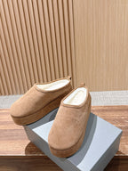 Balenciaga tan suede slip-on sandals with padded white interior and low wedge heel