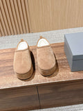 Balenciaga tan suede slip-on sandals with rounded toe and low wedge heel