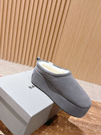Grey Balenciaga slide sandal on its white box, open back and padded insole