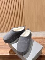 Grey Balenciaga slide sandals with open back, pair on white boxes