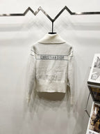 White Dior zip jacket back with 'CHRISTIAN DIOR' logo stripe