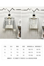 White Dior zip jacket with size chart table
