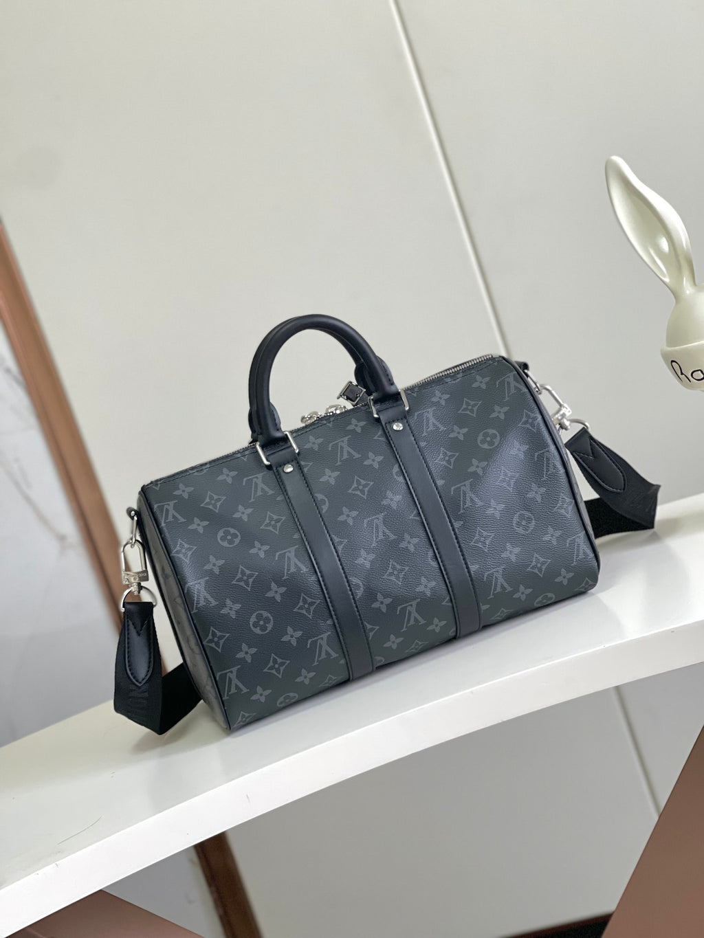 Louis Vuitton duffel bag in dark navy monogram canvas with top handles