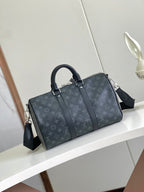Louis Vuitton duffel bag in dark navy monogram canvas with top handles