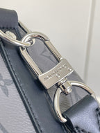 Louis Vuitton bag key holder and clasp on dark navy leather trim
