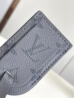 Louis Vuitton bag leather pocket lining panel in dark navy with curved edge stitching