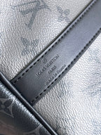 Louis Vuitton bag leather label and stitching on dark navy trim