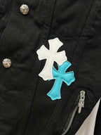 Louis Vuitton denim jacket detail with zipper tab, silver buttons, and blue cross applique