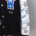 Varsity jacket sleeve with white base, blue stripes, star patches, and knit cuff.