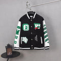 Black varsity jacket with white stripes, snap buttons, and green graphic patches