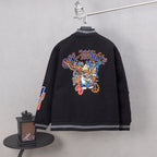 Black varsity jacket back with large embroidered dragon graphic and striped trim.