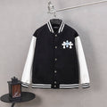 Black varsity jacket with button front, striped ribbed collar, and cross emblem