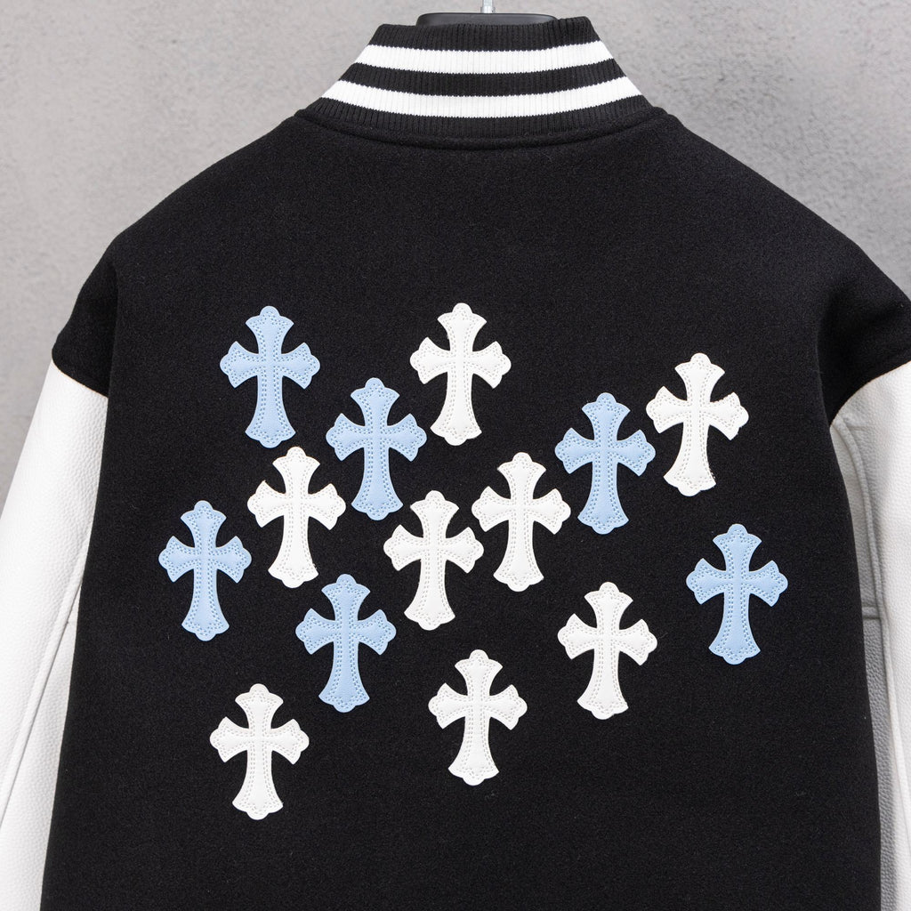 Black jacket back with large cross graphic in white and light blue
