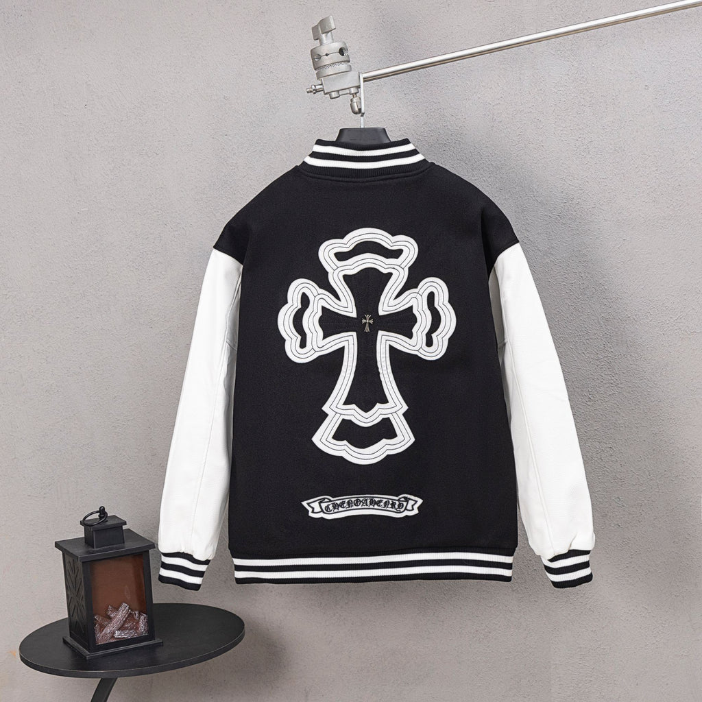 Black varsity jacket with large white cross graphic and striped ribbed cuffs