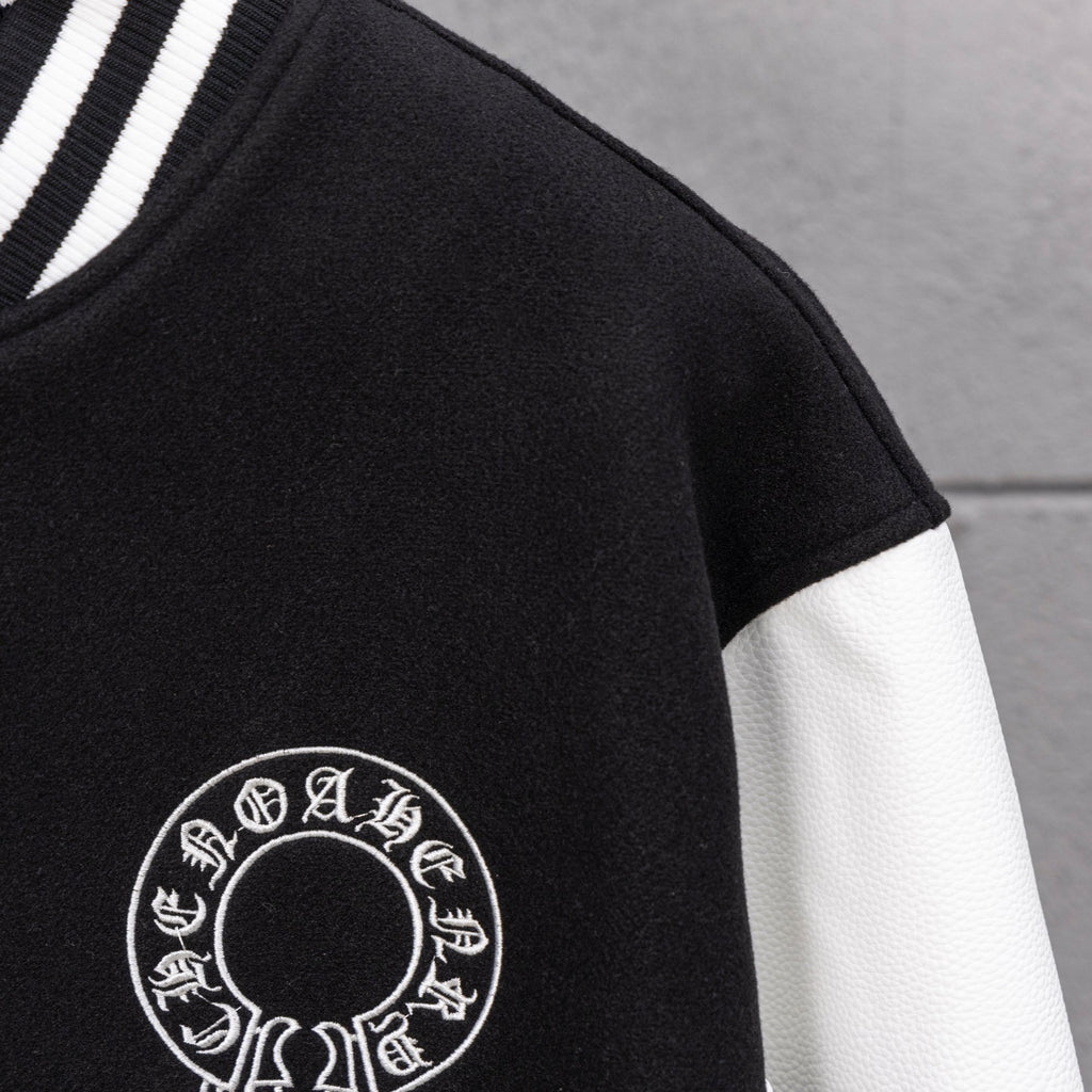 Black jacket sleeve with white circular emblem print
