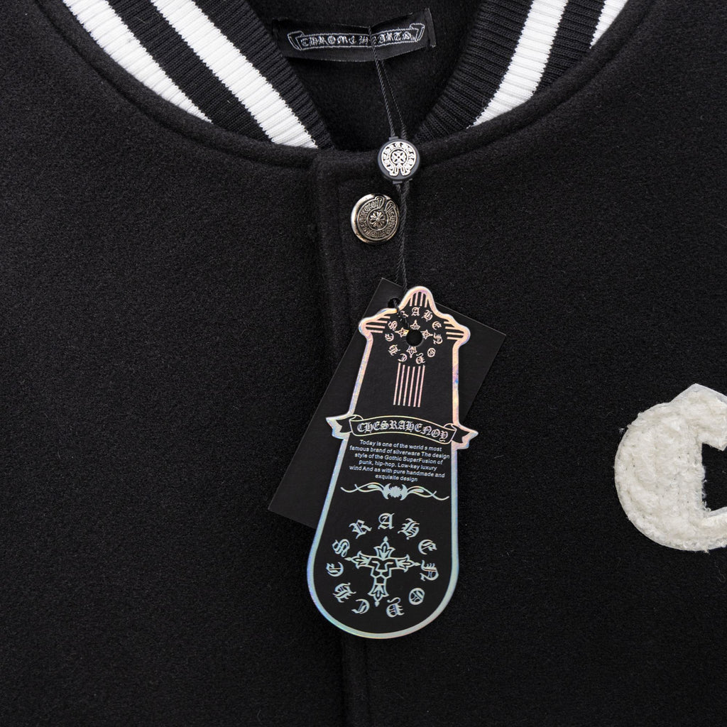 Black varsity collar with striped ribbing and snap button detail